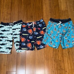 Gymboree boys bundle of swim trunks, sharks, fish, octopus size large (10-12)